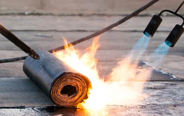 Raw Green asphalt flat roofing repairs